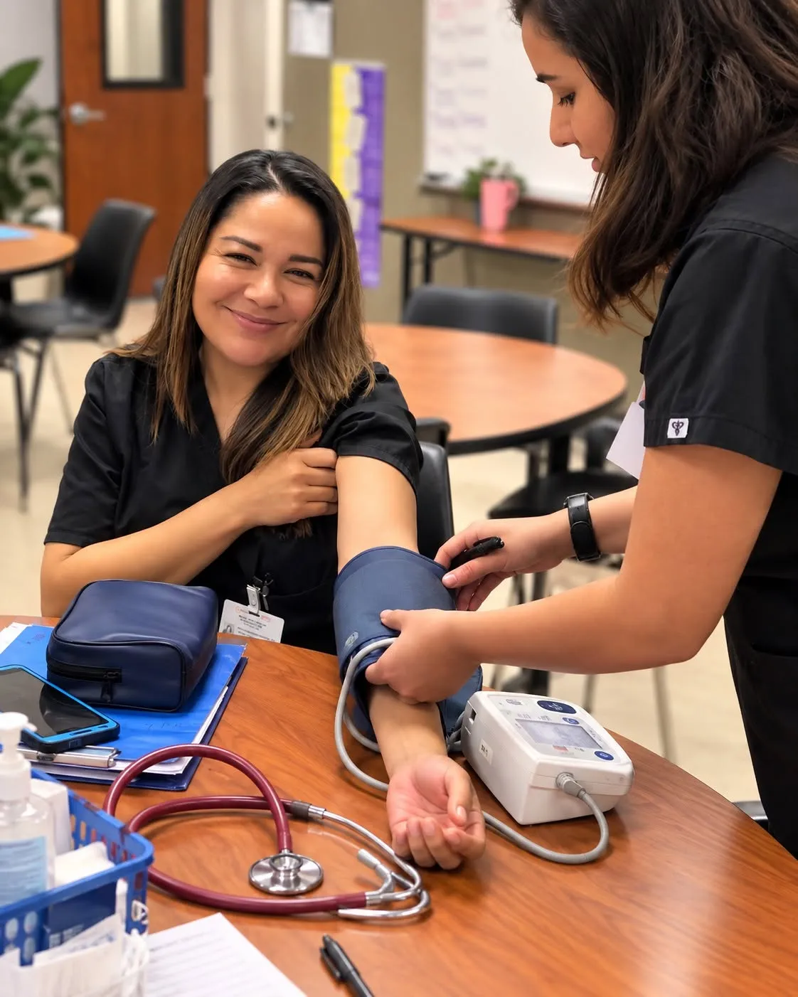 Lamson Medical Assistant student taking a blood pressure reading